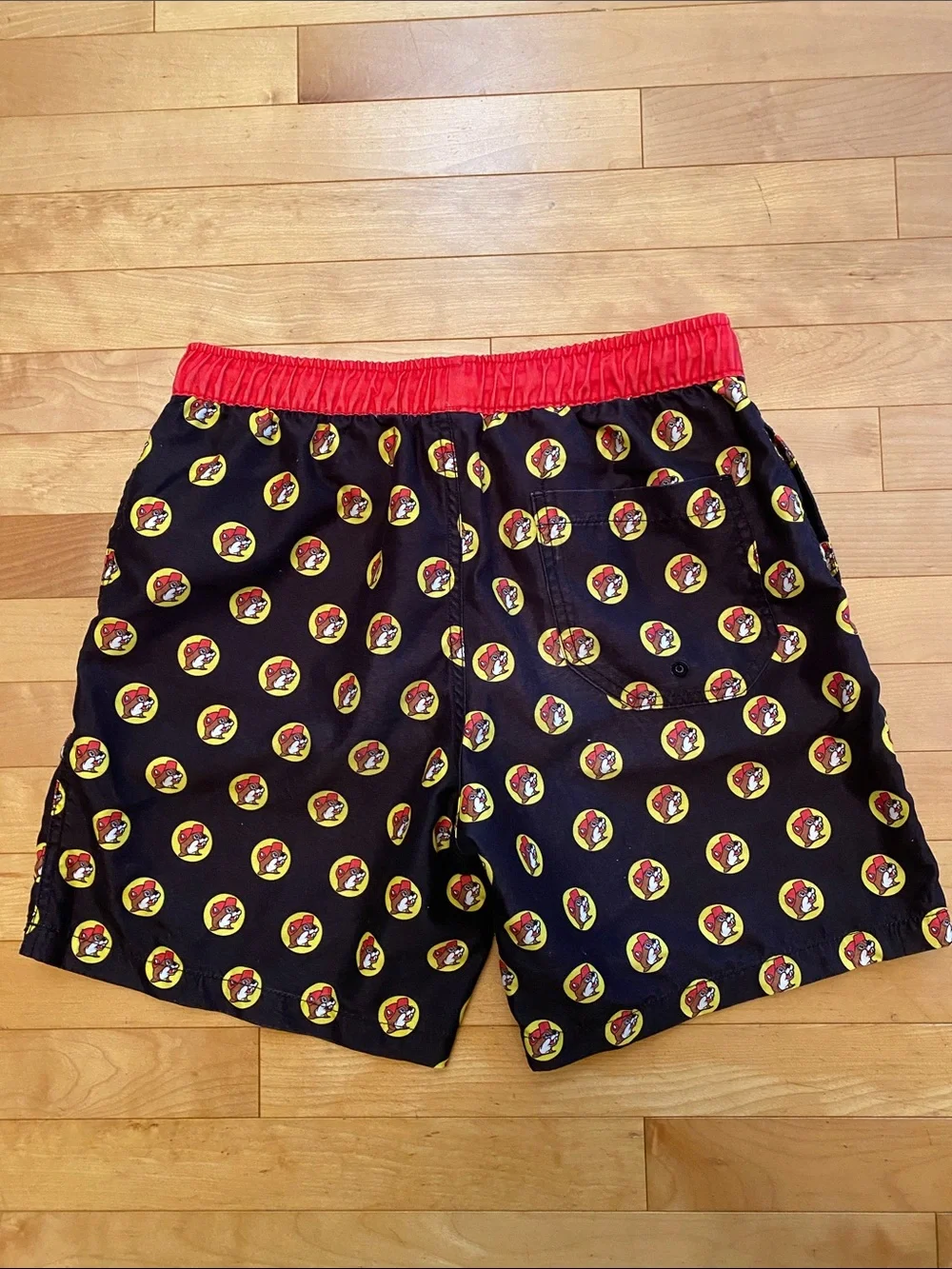 Men's Buc-red Black Swim Trunks with Red Waistband and Yellow Accent Print